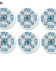 Six handmade cabinet knobs in a Talavera style Spanish tile design. Colors include blue, orange and white.