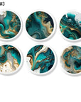 Cabinet knob featuring abstract alcohol ink design in turquoise, gold, and black
