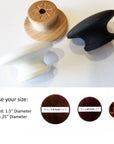 Reference image showing cabinet knob color options in black, white, and natural wood, with size comparison between 1.25 inch and 1.5 inch knobs.