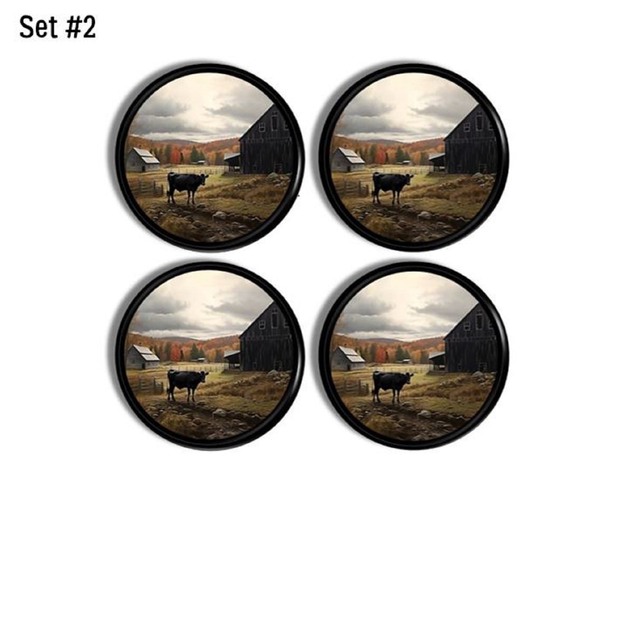 Set of 4 rustic farmhouse cabinet knobs. Drawer pulls decorated in a vintage pasture scene where a black cow stands amongst colorful autumn trees.