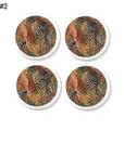 Earth‑tone botanical cabinet knobs. Decorative hardware featuring layered autumn foliage and abstract leaf forms with warm seasonal accents for organic modern and rustic‑refined décor