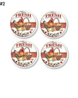Farm fresh egg kitchen cabinet knob hardware. Decorated in red check with country chickens on white drawer pulls. Rustic furniture handles.