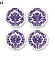 Four piece set of decorative door handles. Purple and white damask for a modern vintage chic furniture accent with unique handle hardware.