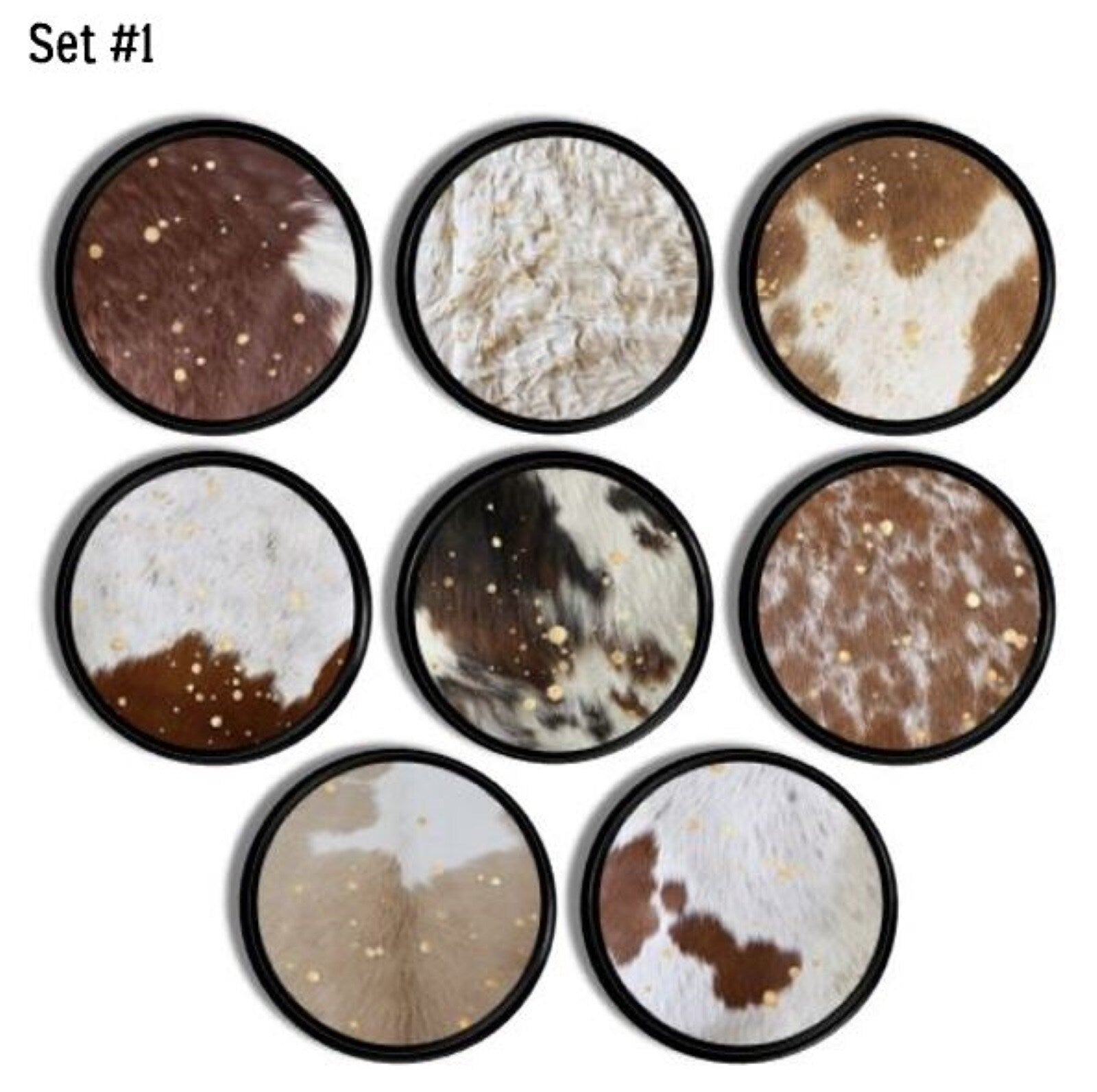 Cow print furniture drawer pull handles bade on black base hardware. Variety of brown, blond and white cow fur prints.