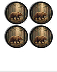 4 Rustic wildlife cabinet knobs and drawer pulls featuring a brown bear walking through a sunlit forest for lodge, cabin, and nature‑inspired décor