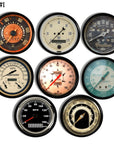 Set of 8 automotive-themed drawer knobs featuring vintage speedometer graphics, MPH dials, retro car brand logos like Indian, and classic dashboard-style designs.