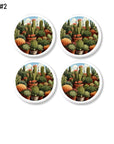 Four handmade furniture knobs with colorful cacti graphic on white. Drawer pulls for Southwestern or Texas boho home decor.
