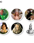 Wizard of Oz cabinet knobs featuring Tin Man, Scarecrow, Cowardly Lion, Glinda, Wicked Witch, and the Wizard on white base knob