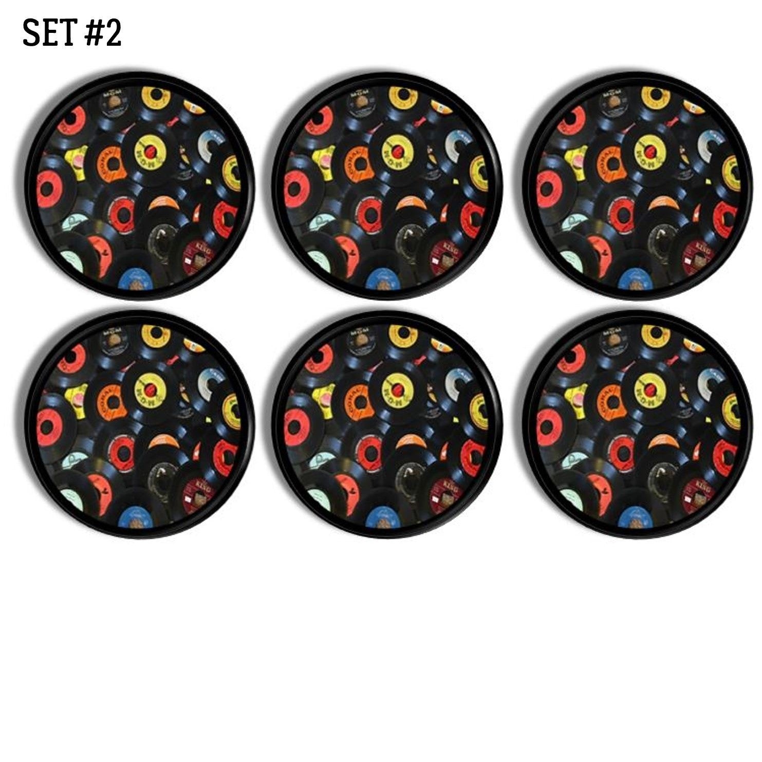 6 Rock n roll theme cabinet knobs decorated in colorful red, yellow, blue and orange vinyl records. Retro 1950s jukebox style 45s .