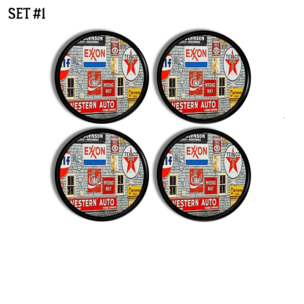Four masculine decor cabinet knobs in an old antique style. Black drawer pull with colorful graphic of vintage signs on a white brick gas station wall.