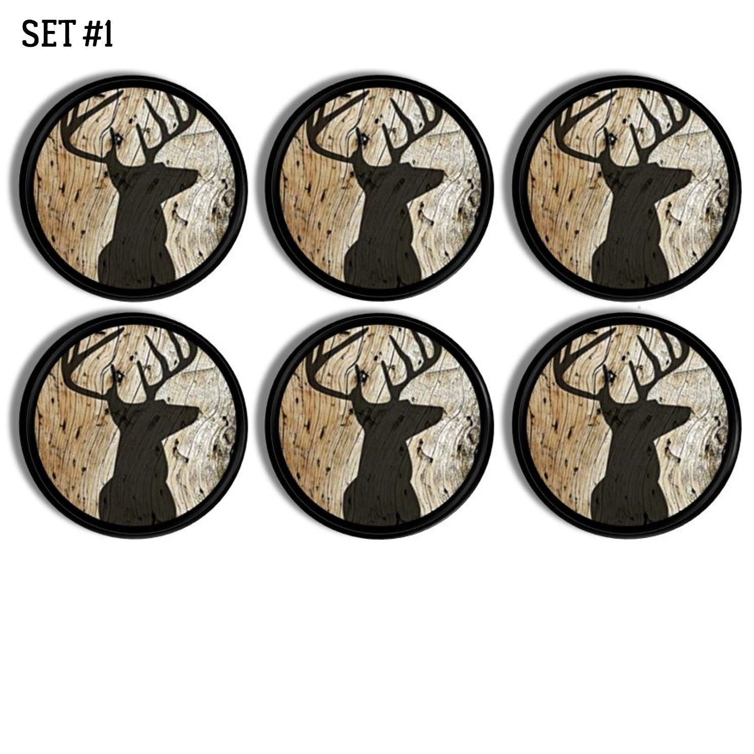 6 rustic buck head hunting theme cabinet knobs. Black deer silhouette on brown knotty wood. Pull handles for furniture drawer, cabinet door or wall hook.