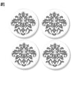 4 Handmade decorative dresser drawer knobs with medium gray floral damask on white drawer pull.