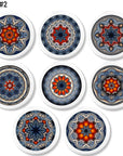 Eight handcrafted cabinet knobs featuring kaleidoscope mandala designs in vibrant blue, red, and orange tones — each with a unique geometric pattern inspired by quilt symmetry and artisan styling. Perfect for expressive drawer pulls in Boho, Indie, or Cottagecore interiors.