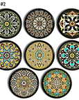 Handmade cabinet drawer pull set decorated with colorful bohemian floral mandala art on a black knob.