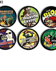 Six handcrafted cabinet knobs featuring retro sci‑fi and horror movie poster designs with creatures, aliens, mummies, and dramatic vintage artwork.
