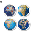 Four handcrafted globe drawer pulls featuring Africa-centered map designs in varied cartographic styles — from political to terrain — mounted on white knob bases for a clean, scholarly look. Ideal for classroom furniture, study cabinets, or travel-themed shelving.