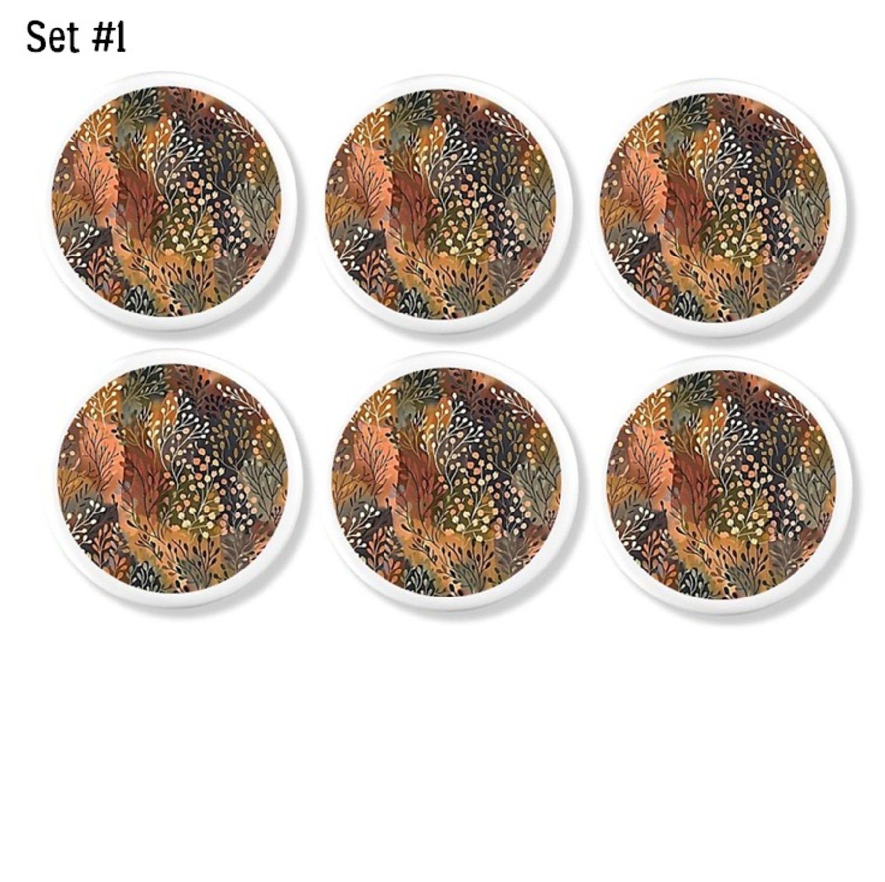 Autumn foliage cabinet knobs and drawer pulls featuring abstract botanical leaves in warm earth‑tone hues with dotted accents for earthy modern and rustic‑refined décor