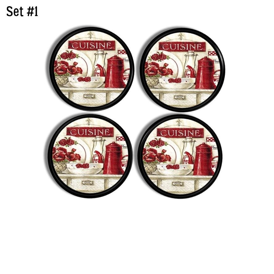 Four black cabinet knobs decorated with retro red-and-white CUISINE kitchen scenes inspired by vintage café décor.