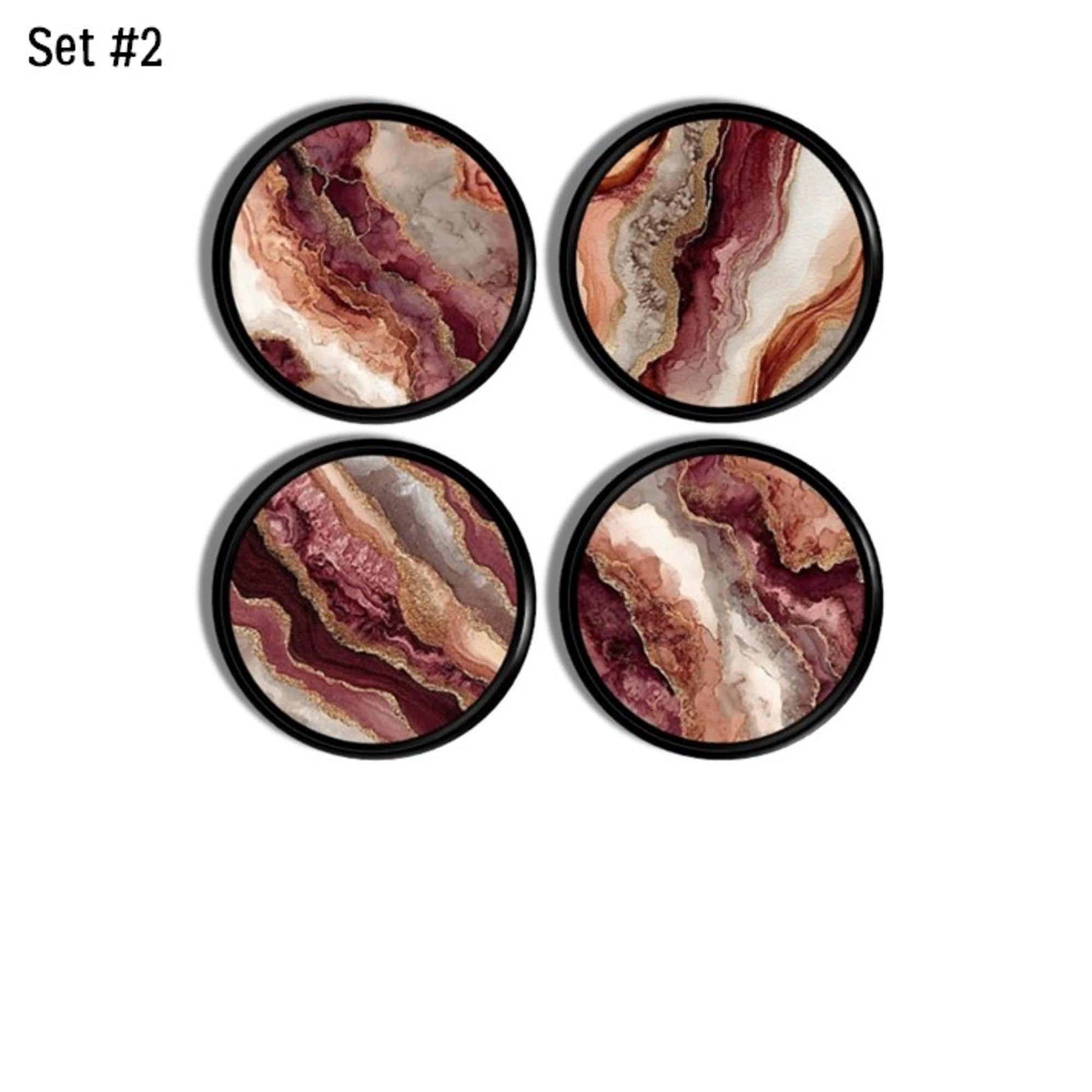 Burgundy and rose agate‑print cabinet knobs with warm mineral banding, shown as a coordinated 4‑piece set