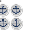 Four coastal cabinet knobs with navy blue anchors on gray and white chevron background. Nautical accent hardware for drawers, vanities, or lake house cottage furniture projects.