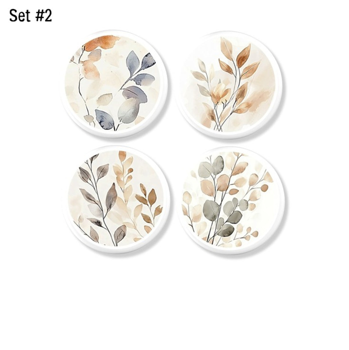 Four-piece neutral foliage cabinet knob decorative hardware set featuring watercolor botanical artwork in beige, taupe, sage, and soft gray tones on white knob bases, ideal for Japandi interiors, earthy modern furniture, calming bedroom decor, and nature-inspired dresser makeovers