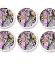 Six white cabinet knobs with vibrant pink camo patterns inspired by outdoor gear, hunting style, and nature‑themed rooms.
