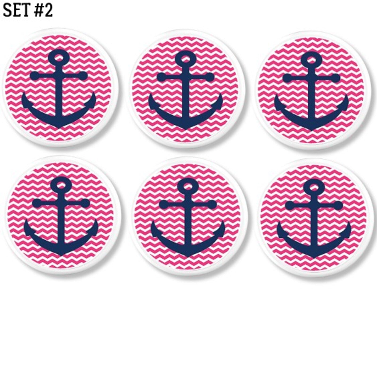 Six handcrafted cabinet knobs featuring navy blue anchors on pink and white chevron background. Nautical drawer pulls for coastal girls’ room, beach cottage style, or whimsical bathroom décor.