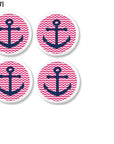 Four handcrafted cabinet knobs with navy blue anchors on pink and white chevron background. Nautical hardware for coastal vanities, themed dressers, or playful accent furniture.