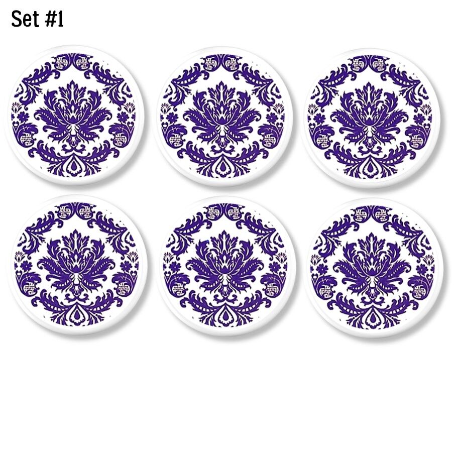 Set of 6 chic furniture knobs decorated with an ornate damask in deep purple on a white background. Cabinet drawer pulls for a feminine regal bathroom.