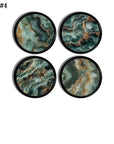 Set of four teal, emerald, and brown marbled cabinet knobs and drawer pulls with layered agate‑style patterns for modern boho and eclectic décor.