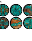 Black furniture drawer pull hardware in a rustic turquoise and brown western cowhide theme. 