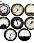 Vintage cabinet knobs in an 8‑piece set featuring industrial gauge prints for pressure, ohms, and water volume.
