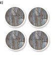 Set of four cabinet knobs with soft gray and blue distressed wood graphics, inspired by reclaimed farmhouse barnwood planks.