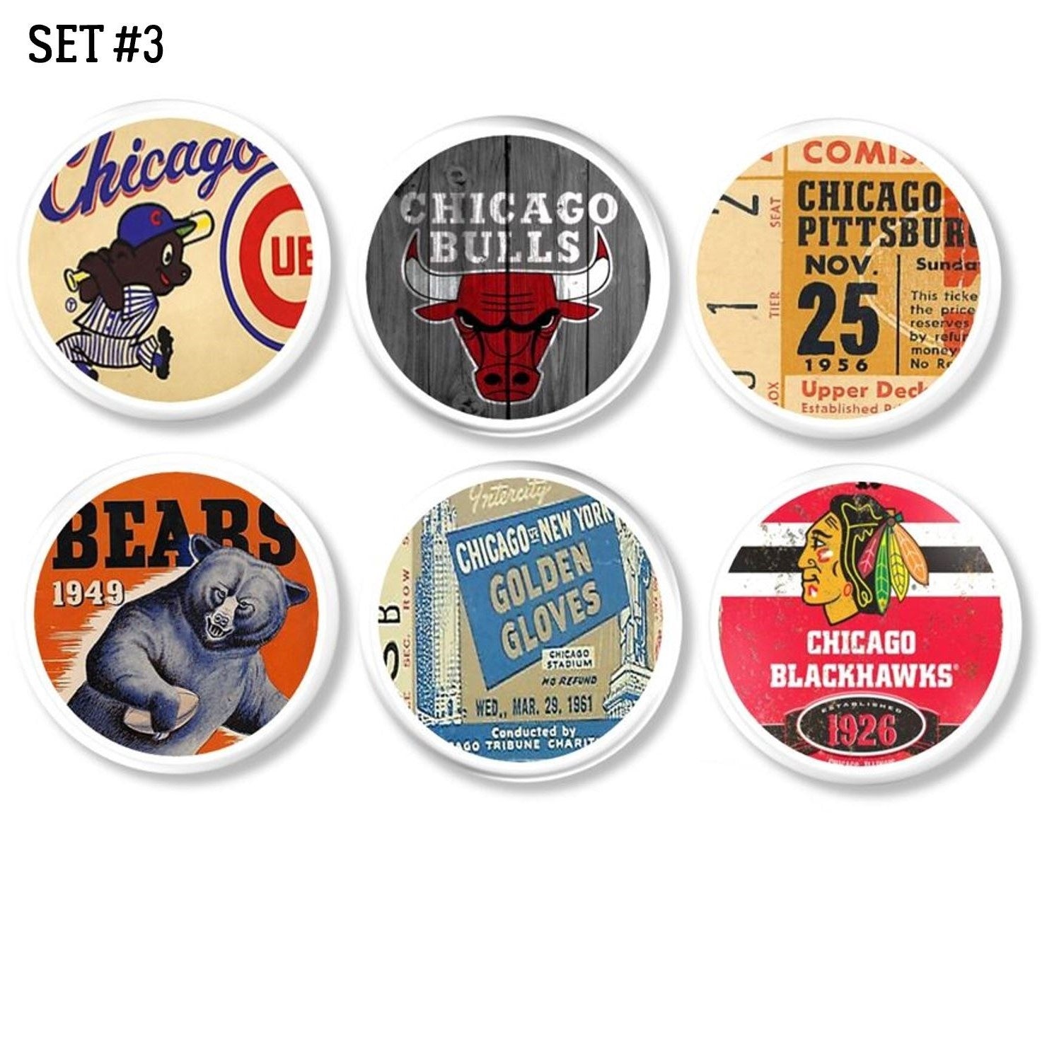 Six white handcrafted cabinet knobs featuring vintage Chicago sports designs. Includes Cubs, Bears, Bulls, Blackhawks, and Golden Gloves boxing graphics. Retro memorabilia hardware set of 6.