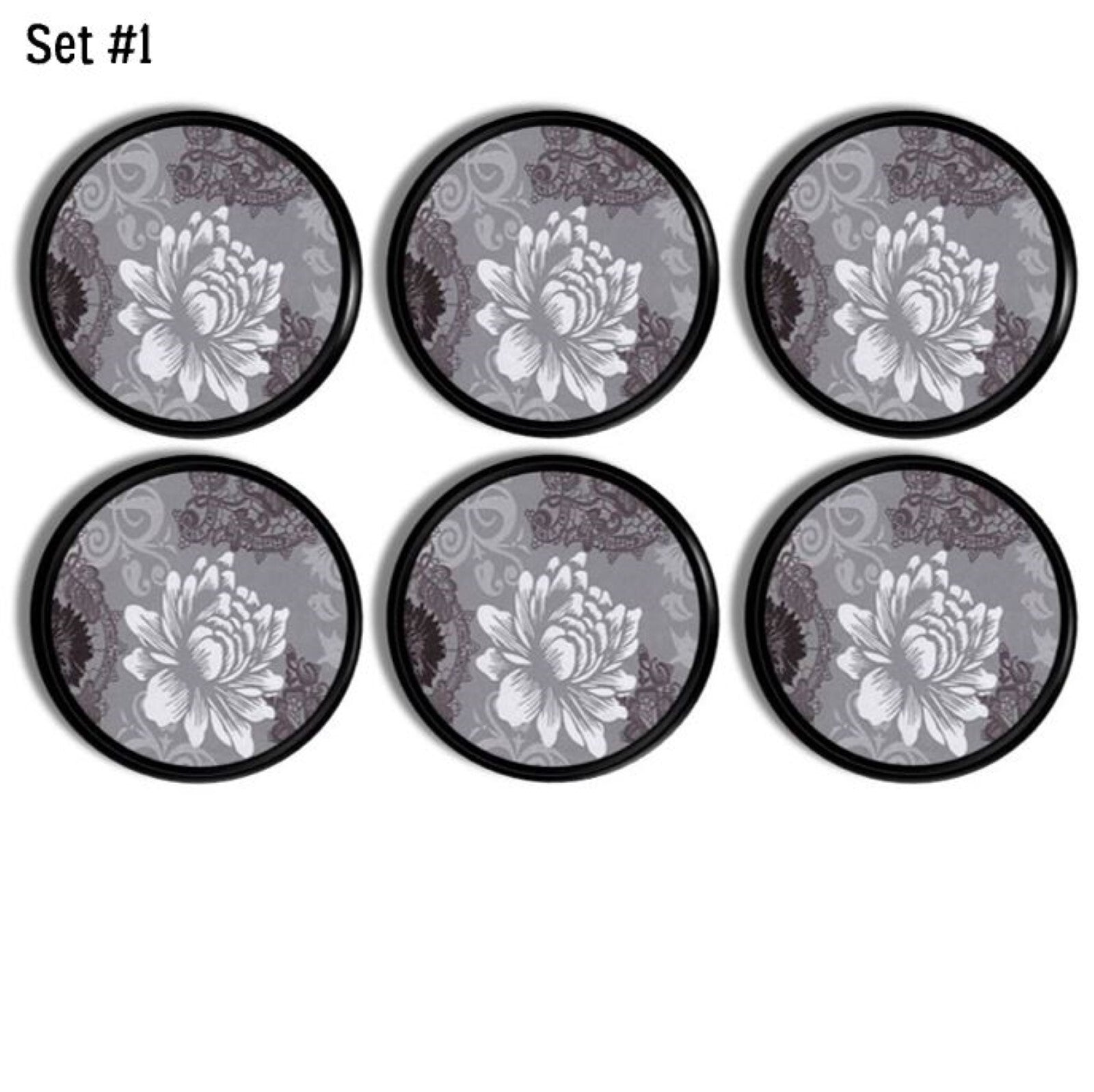 Six handcrafted cabinet knobs featuring white floral designs on layered gray damask with black accents, ideal for modern, feminine, or Asian-inspired décor.