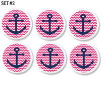 Young girl or baby nursery cabinet and drawer pull hardware set. Six knobs in bright pink and white chevron with navy blue boat anchor accent.