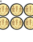 Six vintage anatomical skeleton cabinet knobs featuring full body medical chart illustrations on aged parchment backgrounds ideal for gothic, apothecary, medical office, and anatomy themed décor. 