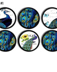 6 Black cabinet door knobs with blue turquoise and yellow peacock tail feathers. Bathroom vanity or furniture drawer pulls.