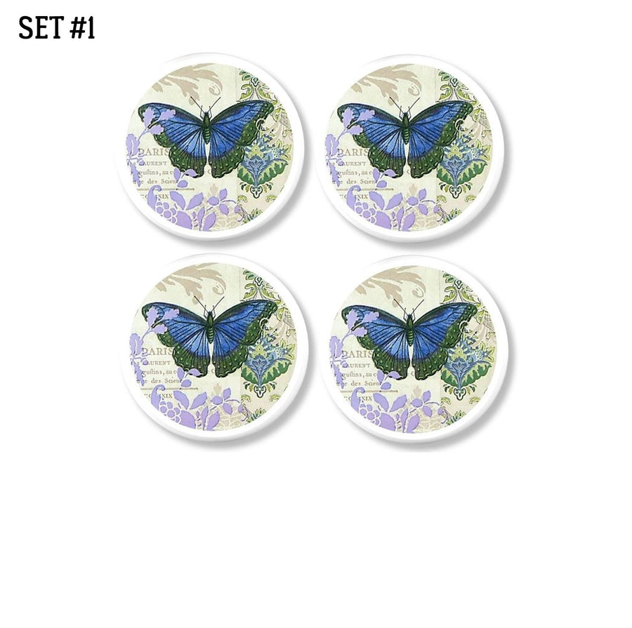4 farmhouse style cabinet door knobs. Blue butterfly, regal floral damask, french script in blue, cream and lilac colors on white drawer pull.