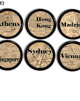 Set of six international destination map knobs featuring Athens, Hong Kong, Madrid, Singapore, Sydney, and Vienna, designed with vintage atlas styling and warm sepia map details.