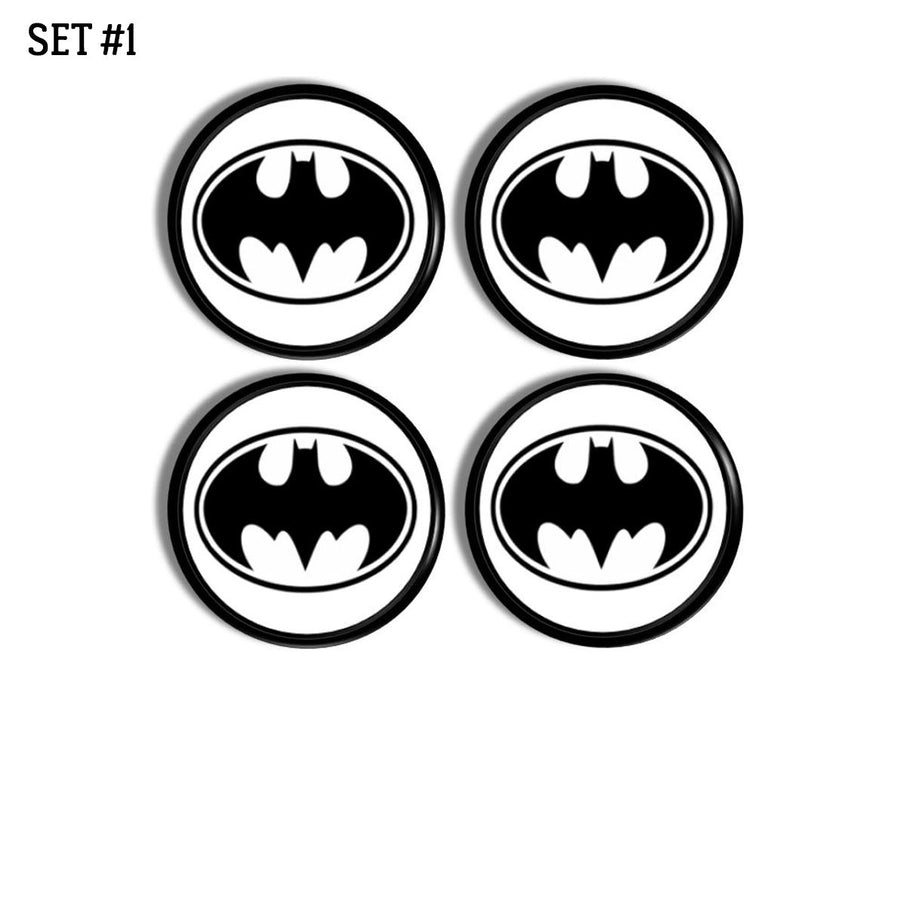 Set of decorative drawer pull hardware are handmade with a black batman symbol on a white background.
