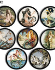 8 Mythical seafarer lore themed handmade knobs with beautiful mermaid illustrations in coastal colors.