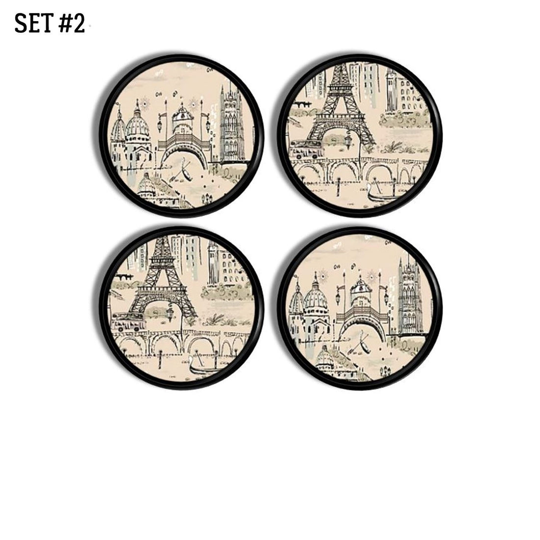 4 Beige on black cabinet door knobs in a Paris France historical landmark theme featuring the Eiffel Tower, Cathedral and river boats along the River Seine.
