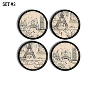 4 Beige on black cabinet door knobs in a Paris France historical landmark theme featuring the Eiffel Tower, Cathedral and river boats along the River Seine.