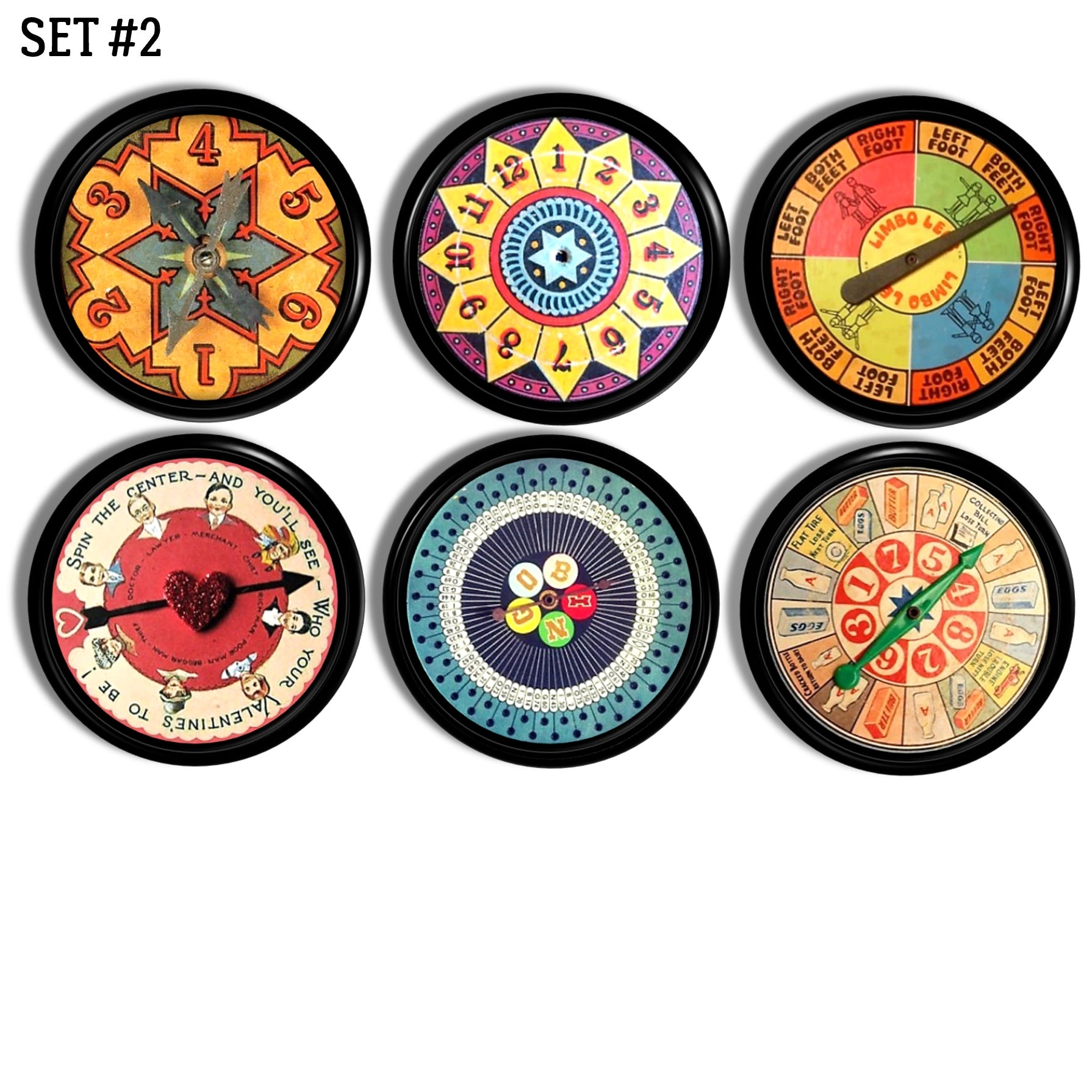 Six retro board‑game spinner cabinet drawer pulls on a black knob, showcasing varied color wheels, playful numbered wedges, and nostalgic toy‑inspired artwork ideal for children’s spaces, craft rooms, or family rec areas.