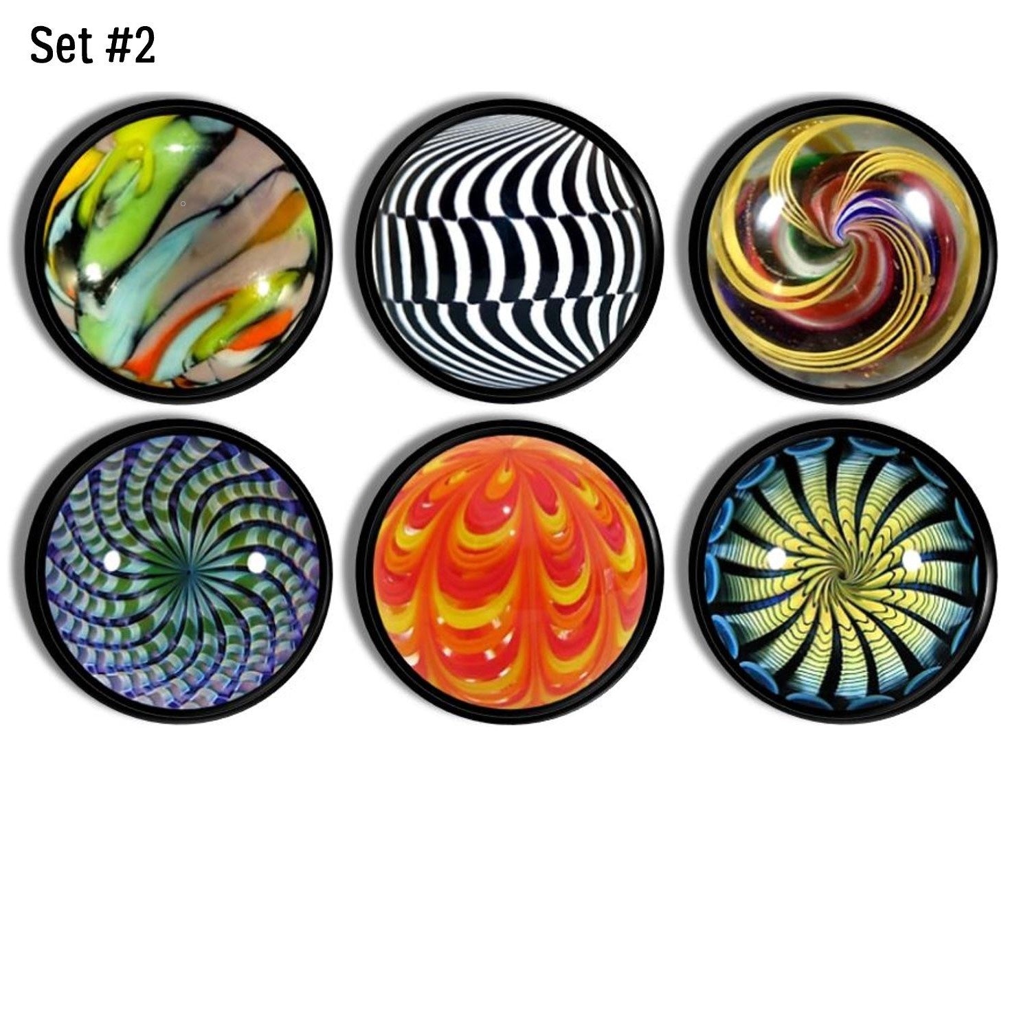 Six retro marble style cabinet knobs, showcasing vibrant optical‑illusion patterns, swirling ribbons, geometric distortions, and colorful abstract designs reminiscent of collectible vintage marbles.