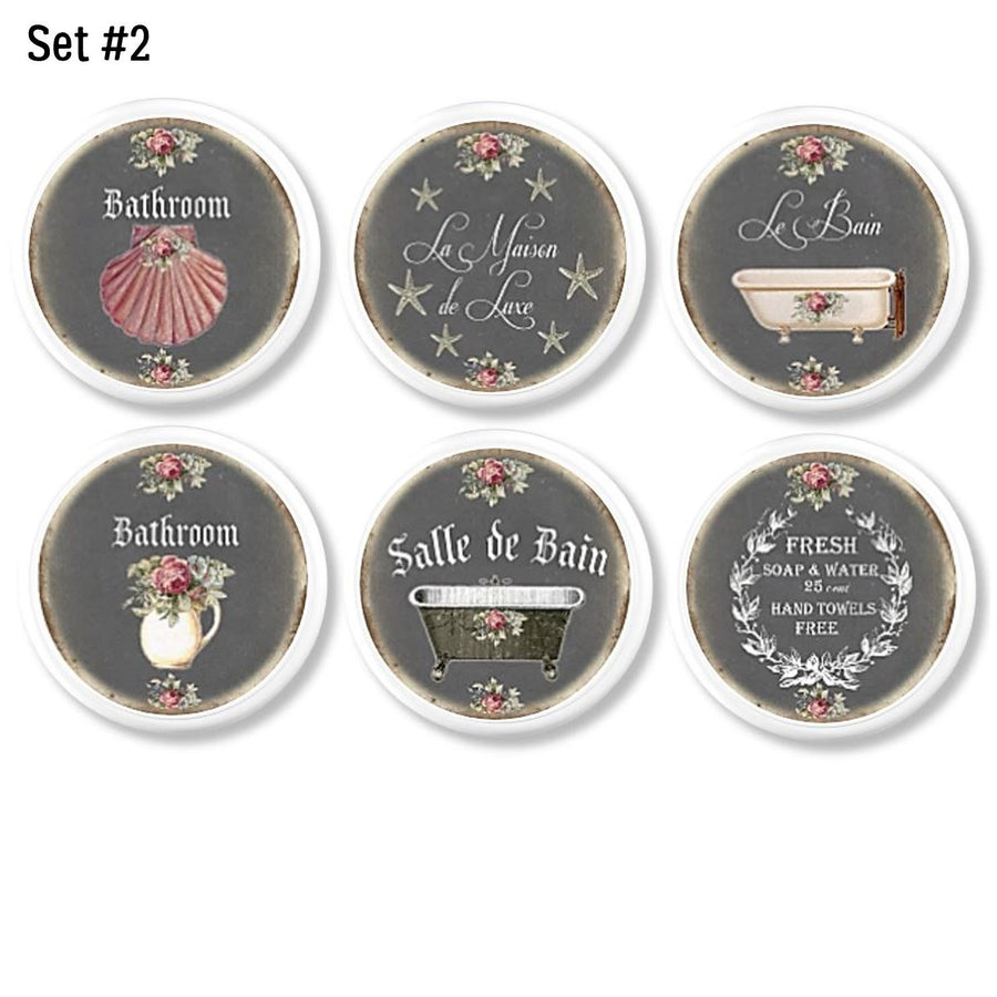 6 French Victorian style bathroom cabinet knobs. Le Bain theme chalkboard look drawer pulls. Seashell, water pitcher, claw bathtub and red rose floral design.