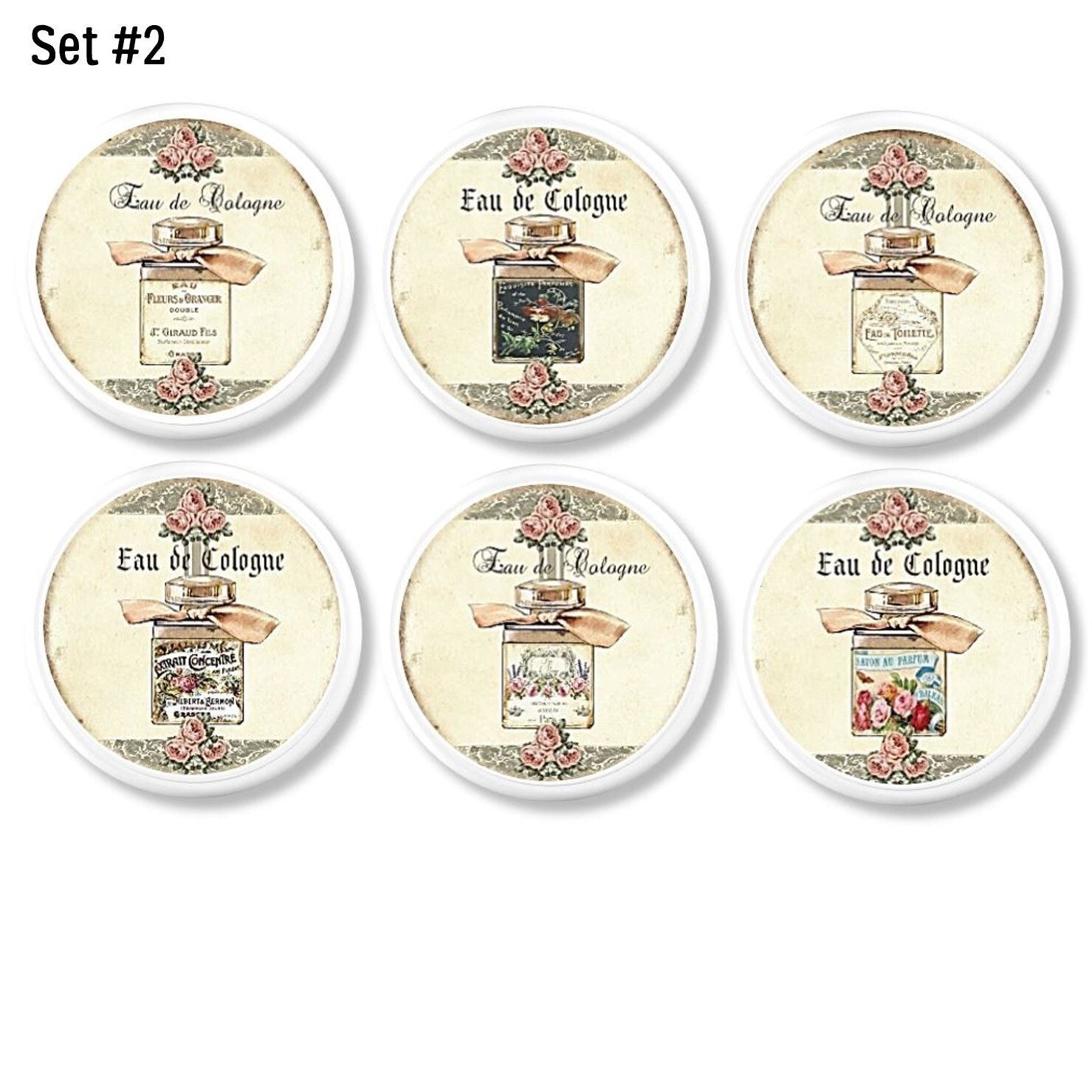 Shabby chic cabinet knobs with vintage perfume bottle illustrations and floral embellishments. Elegant drawer pulls for romantic cottage and Parisian bathroom décor