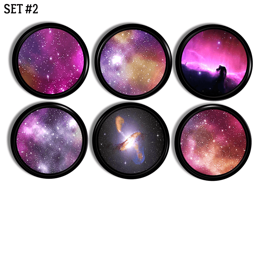 6 drawer pulls decorated with galaxies of outer space star clusters in bright pink, black with blue and gold. Boho wanderlust astrology