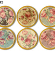 Six handcrafted cabinet knobs featuring vintage rose and peony florals in soft romantic tones, set against varied backgrounds on natural wood — perfect for shabby chic and cottagecore décor.
